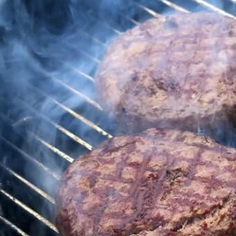 Burgers on Flame Grill Machine